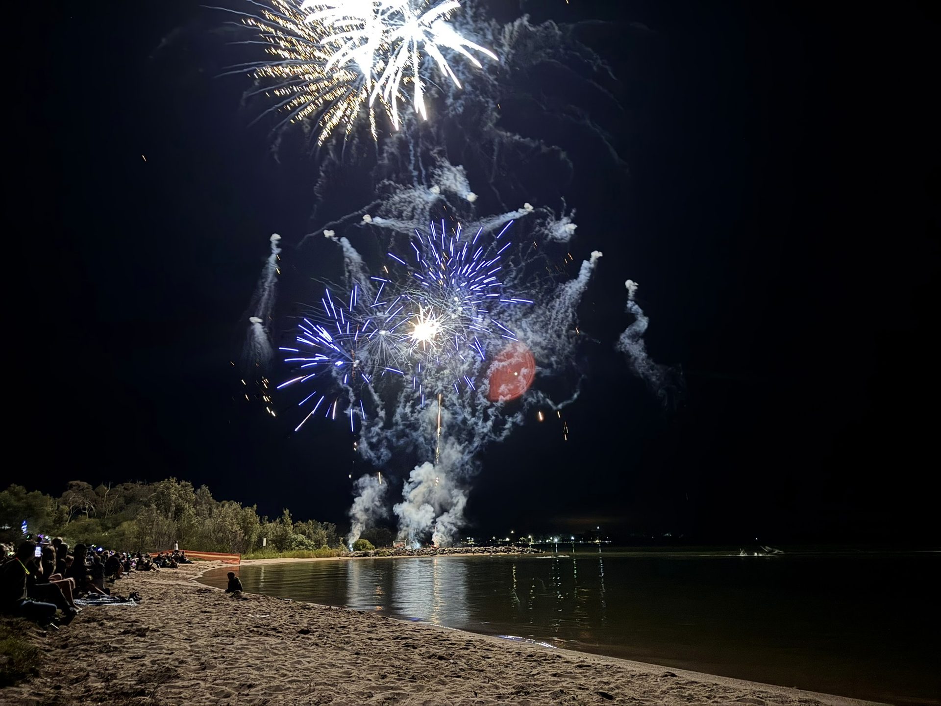 New Year's Eve fireworks lighting up the sky over Loch Sport